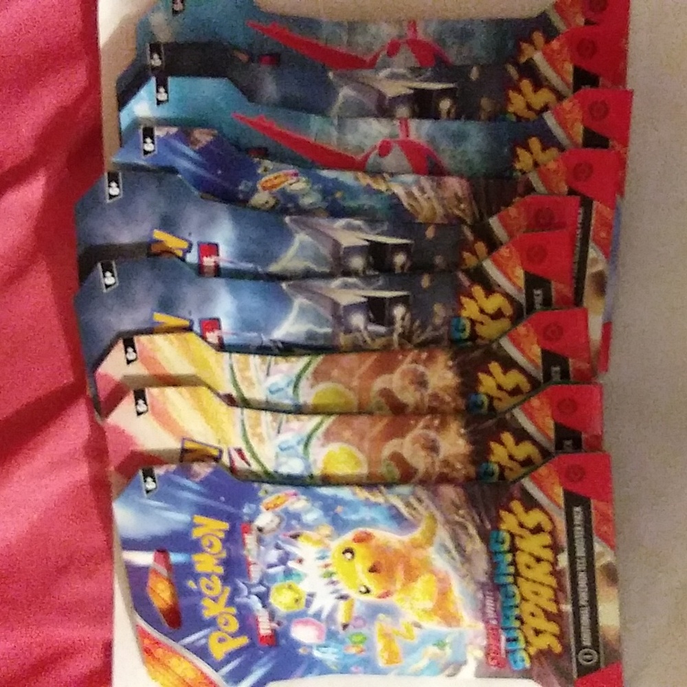 Pokemon scarlet and violet surging Sparks lot of 9 booster packs with sleeves
